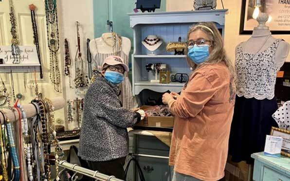 Two women working at the PossAbilities thrift store in Flemington NJ