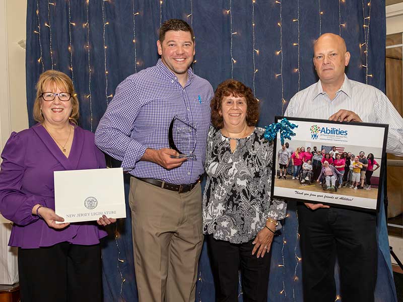The Pohatcong Police Department received a Special Recognition Award during Abilities of Northwest Jersey, Inc.’s annual Diamonds in the Sky gala on April 22 at the Architects Golf Club in Lopatcong, NJ. From left are Abilities CEO Cynthia B. Wildermuth, Pohatcong PD Detective/Sergeant Ryan Barsony, Abilities Phillipsburg Program Supervisor Ruth Scheier, and Pohatcong PD Sergeant Michael Cozze.